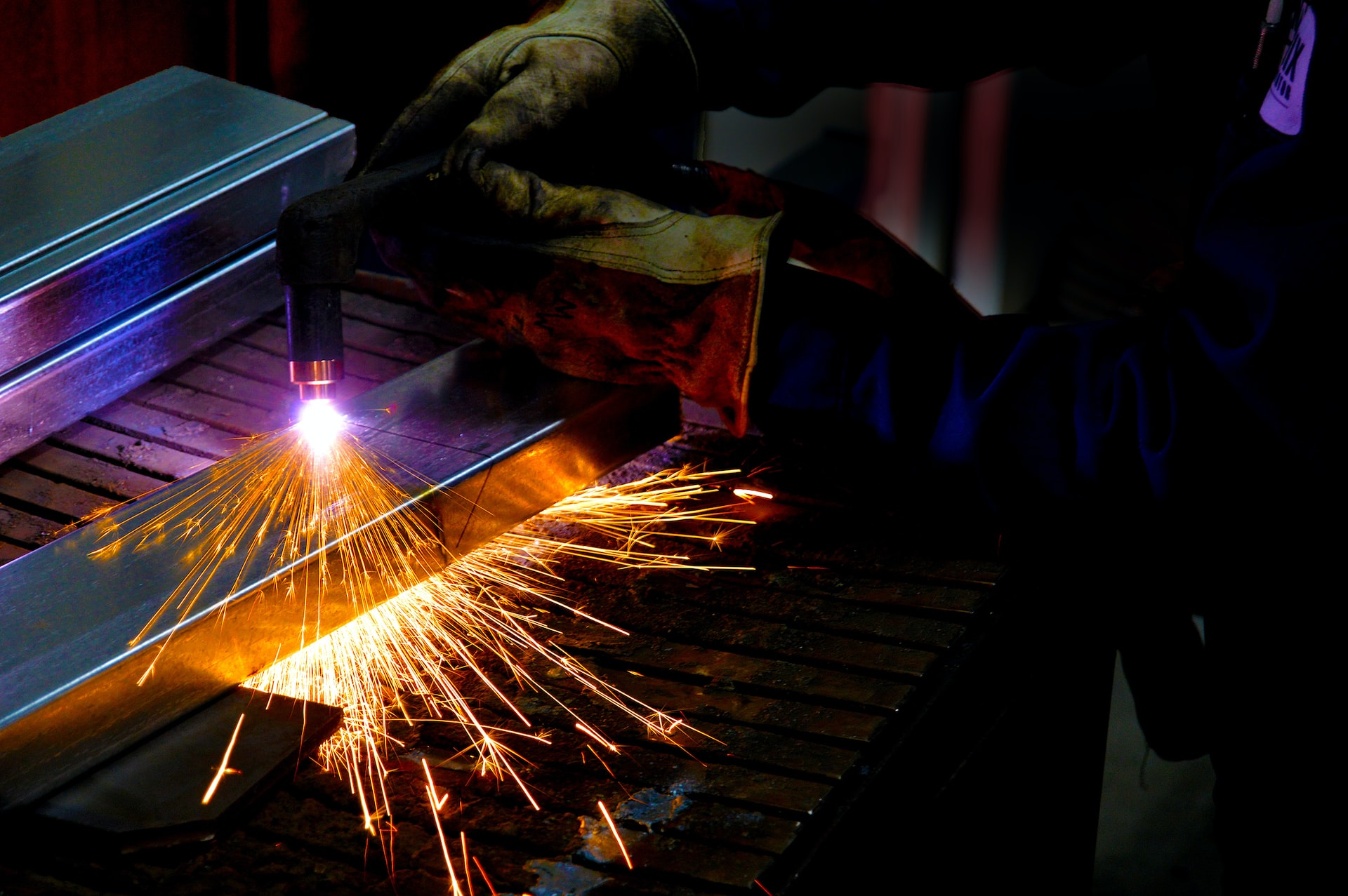 man holding welding torch