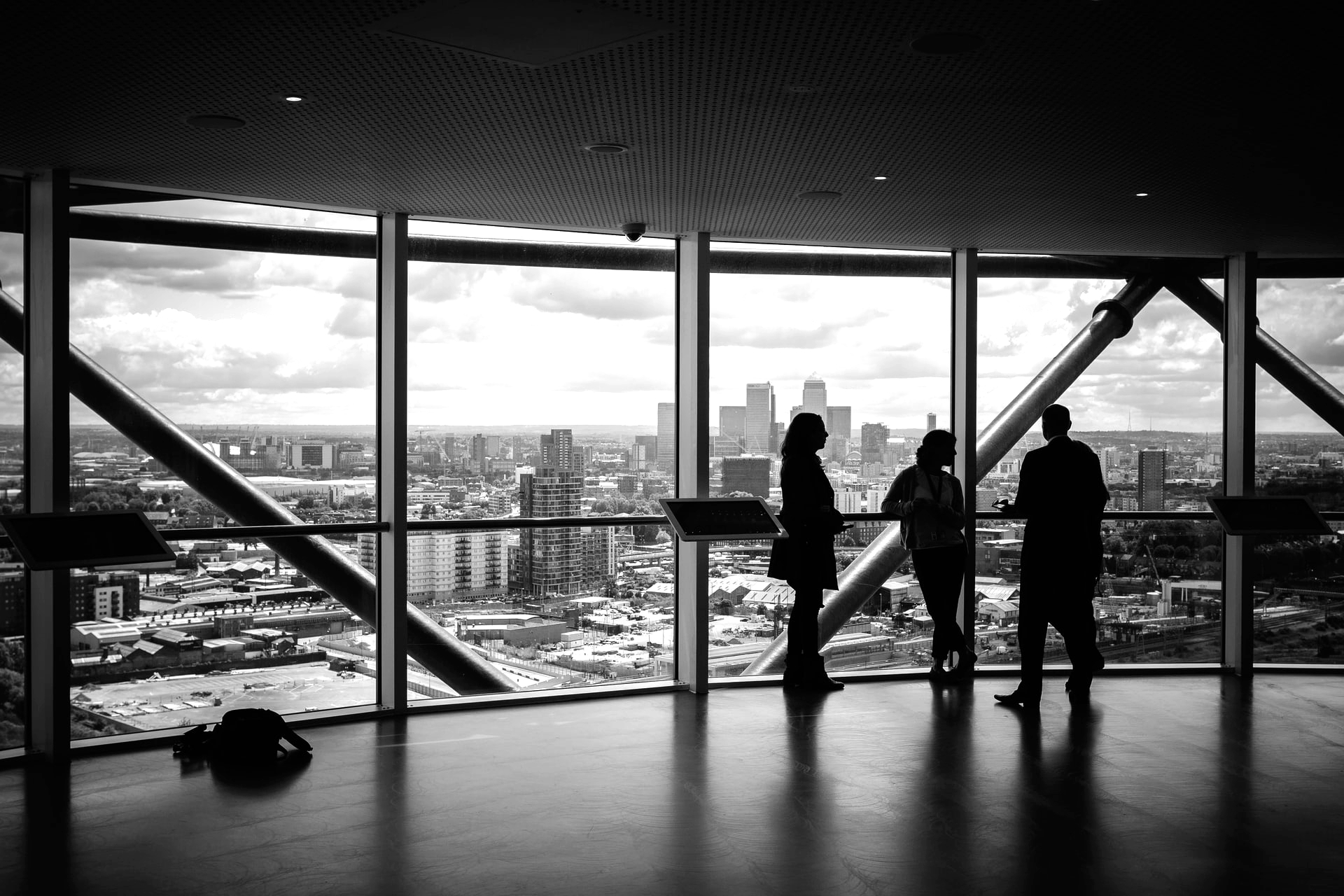 people standing inside city building